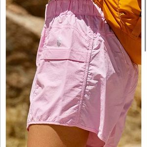 NWOT Free people movement women’s size XS in the wild shorts in prism pink color
